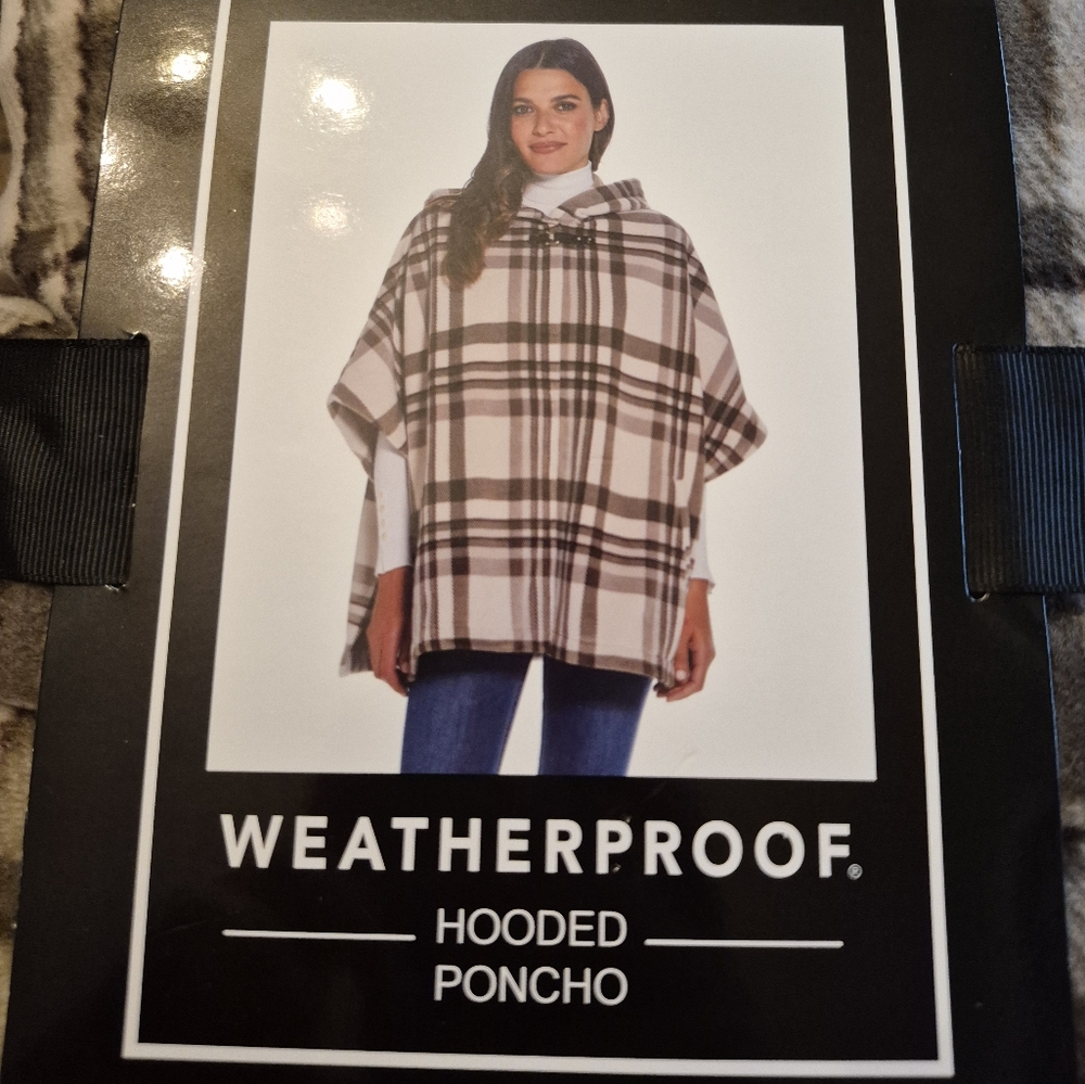 Weatherproof Black and White Raincoat for All-Weather Protection